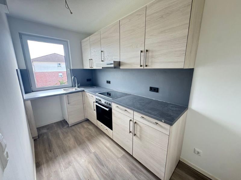 ! Öffentlich gefördert ! Moderne 3-Zimmer-Wohnung mit West-Balkon, Einbauküche und Fußbodenheizung - Foto 2